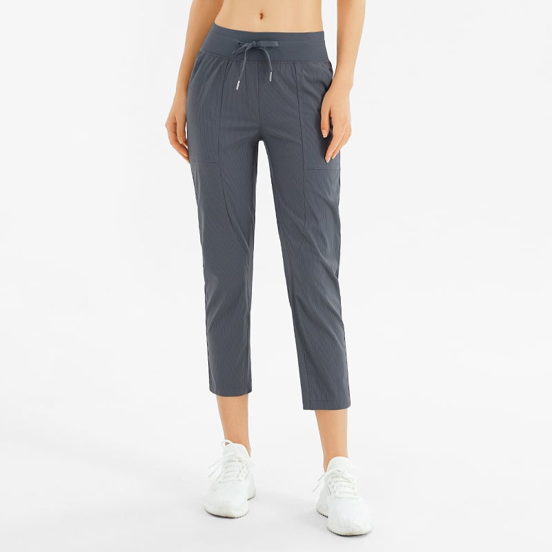 Lösa Yogabyxor Med Nio Punktslängd, Fickor Och Medelhög Midja För Kvinnor