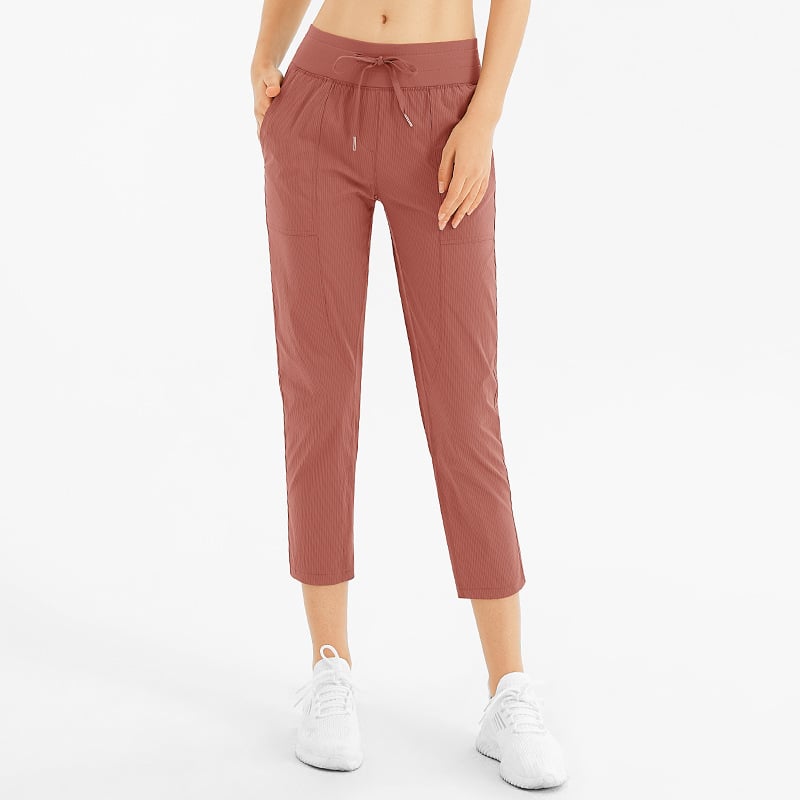 Lösa Yogabyxor Med Nio Punktslängd, Fickor Och Medelhög Midja För Kvinnor