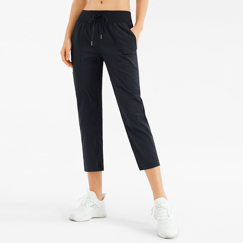 Lösa Yogabyxor Med Nio Punktslängd, Fickor Och Medelhög Midja För Kvinnor