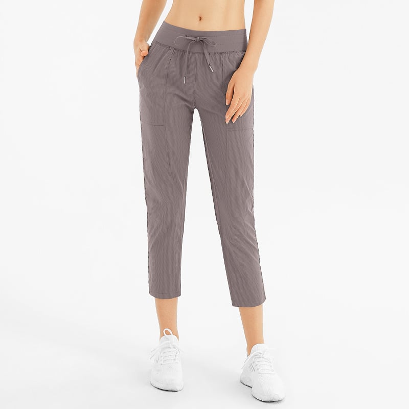 Lösa Yogabyxor Med Nio Punktslängd, Fickor Och Medelhög Midja För Kvinnor