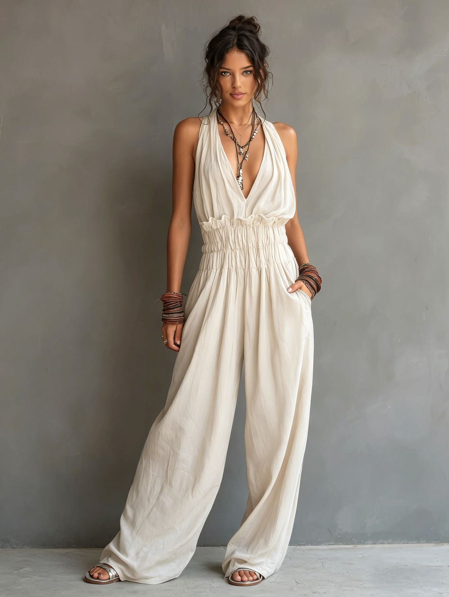 Damjumpsuit Med V-Ringning, Halterneck Och Öppen Rygg Och Vida Ben