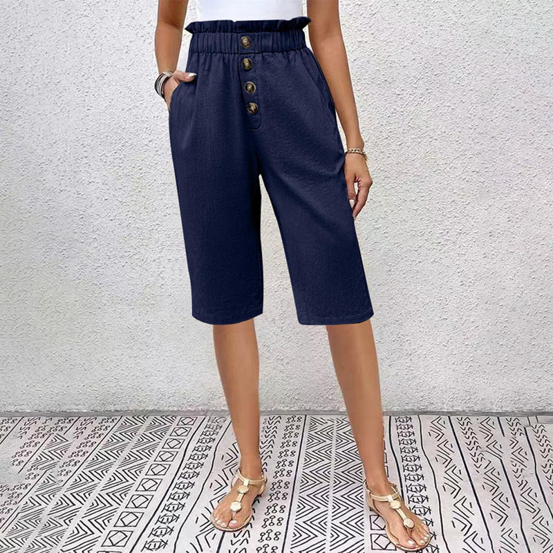Damshorts för sommaren med hög midja, fickor och knappdetalj