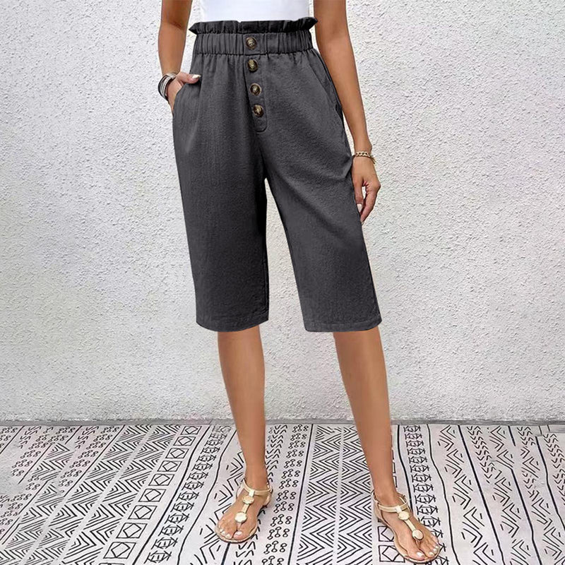 Damshorts för sommaren med hög midja, fickor och knappdetalj