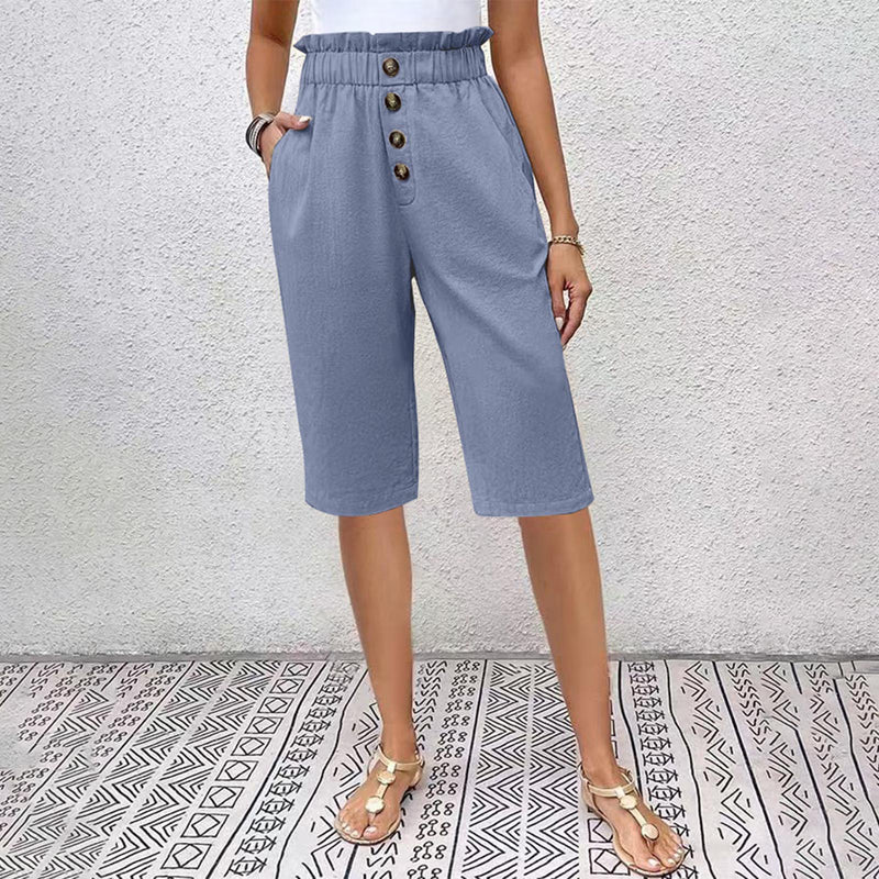 Damshorts för sommaren med hög midja, fickor och knappdetalj