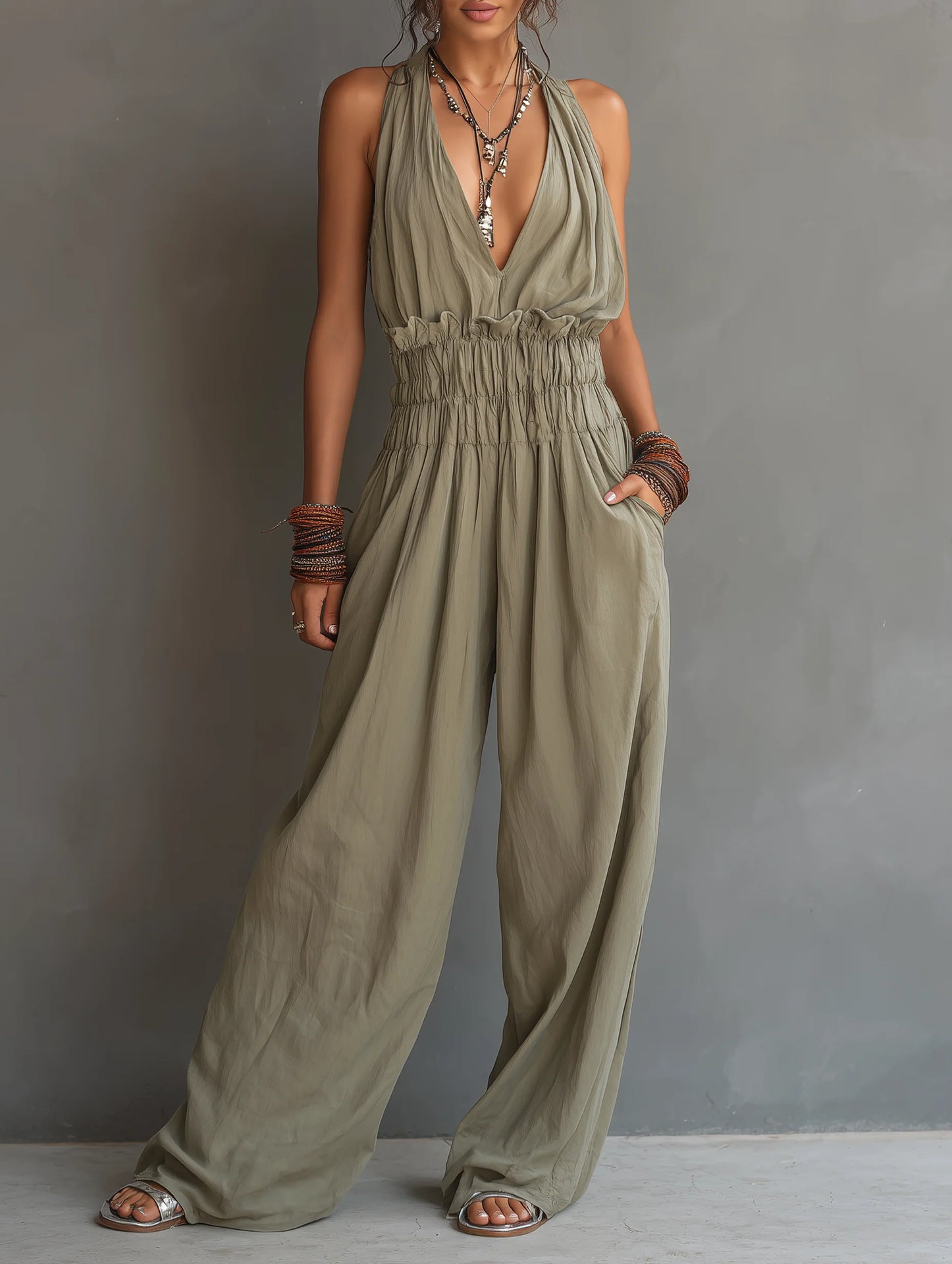 Damjumpsuit Med V-Ringning, Halterneck Och Öppen Rygg Och Vida Ben
