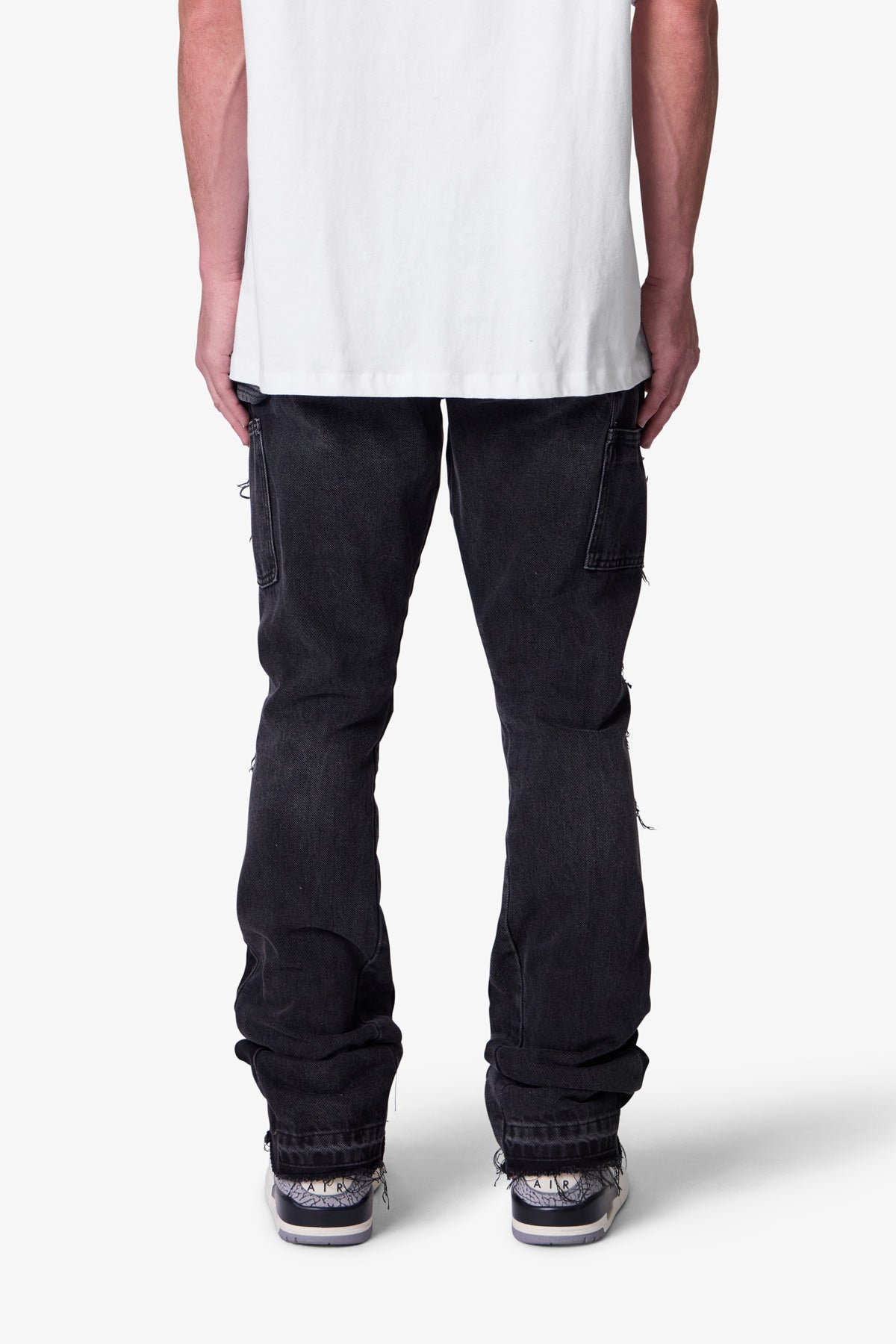 Svarta Flare Jeans Med Smal Passform, Paneldesign, Tvättad Finish, Rå Fåll