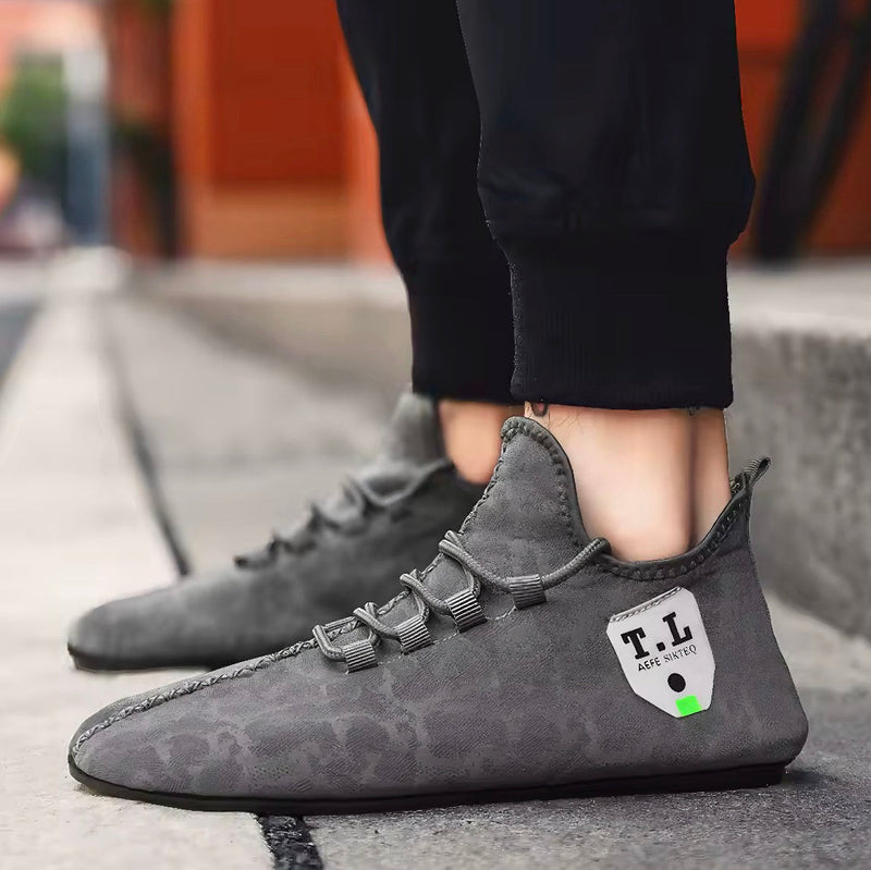 Herrslip-on loafers med fotledsstöd och texturerad sula