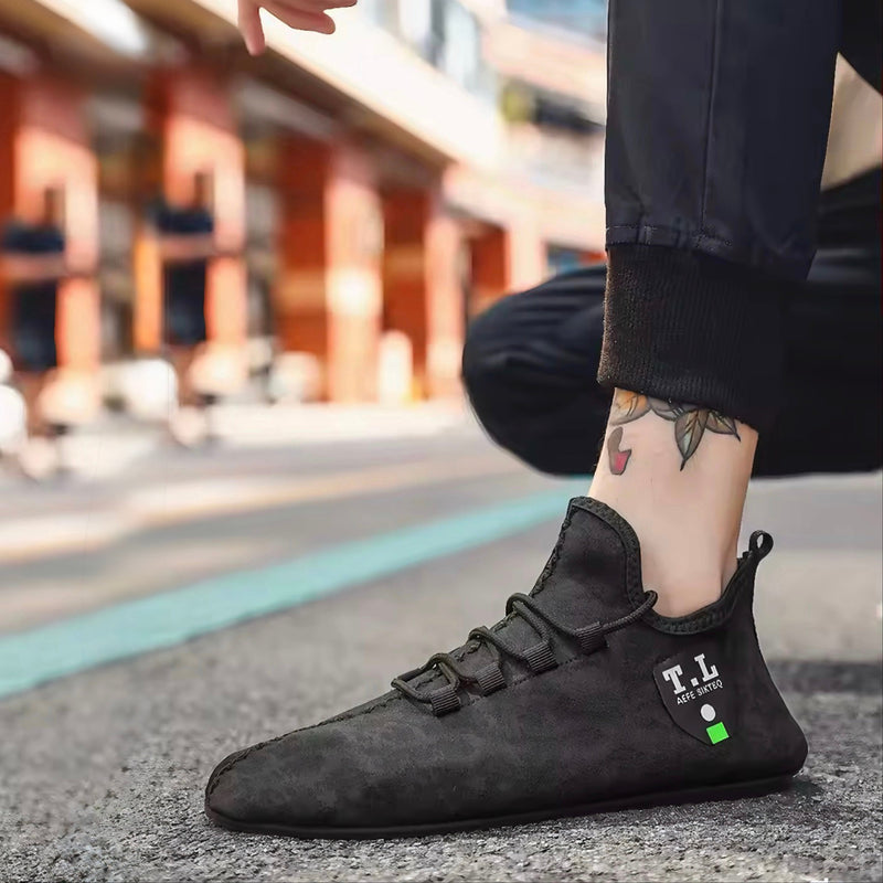 Herrslip-on loafers med fotledsstöd och texturerad sula