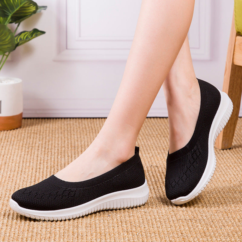 Damslip-on sneakers med hålfotsstöd och bred tåbox