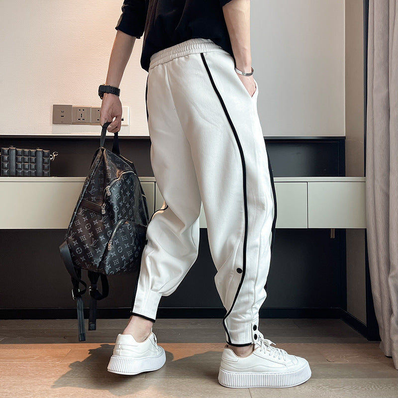 Herr Joggers Med Tapered Passform, Funktionella Fickor Och Knappar Vid Mudd