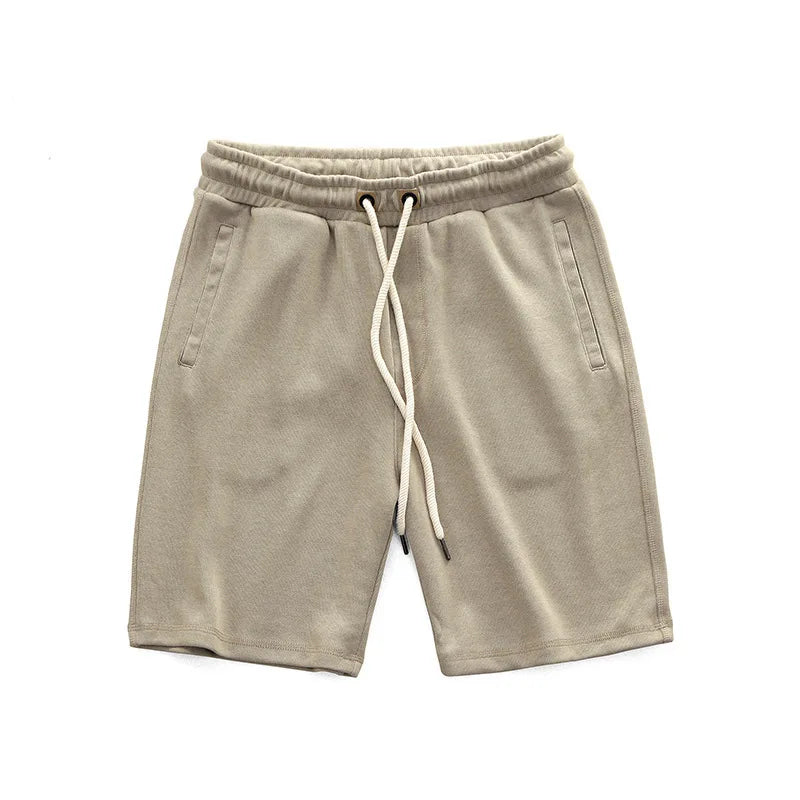 Herrshorts med dragsko i midjan, avslappnad passform och sidofickor
