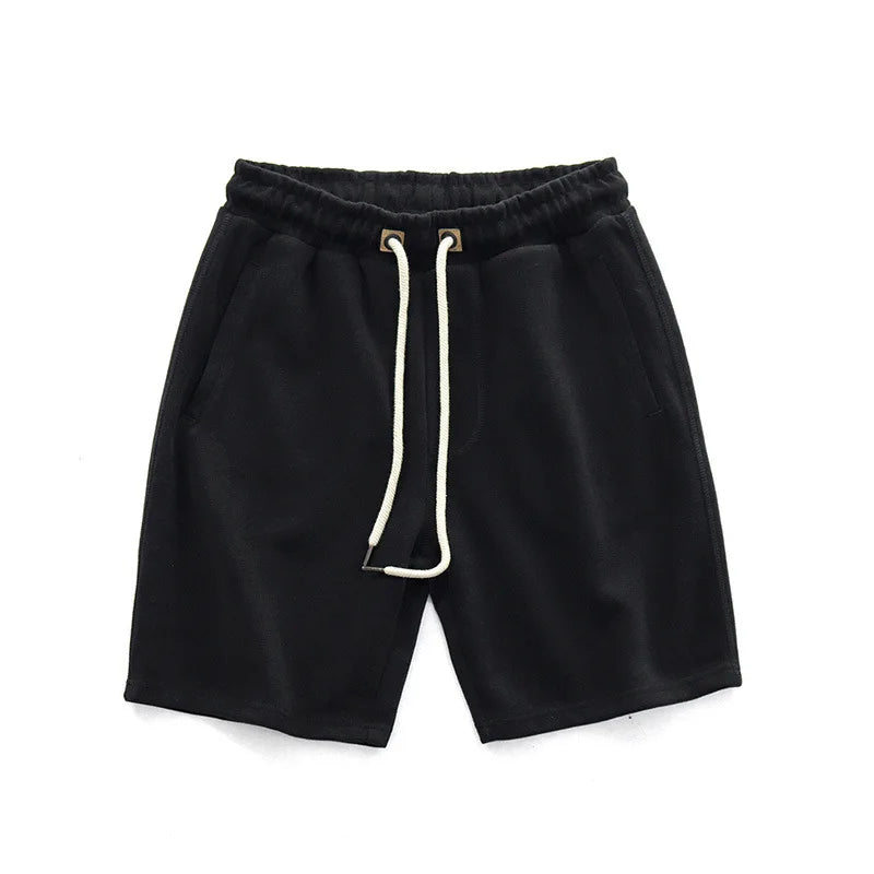 Herrshorts med dragsko i midjan, avslappnad passform och sidofickor