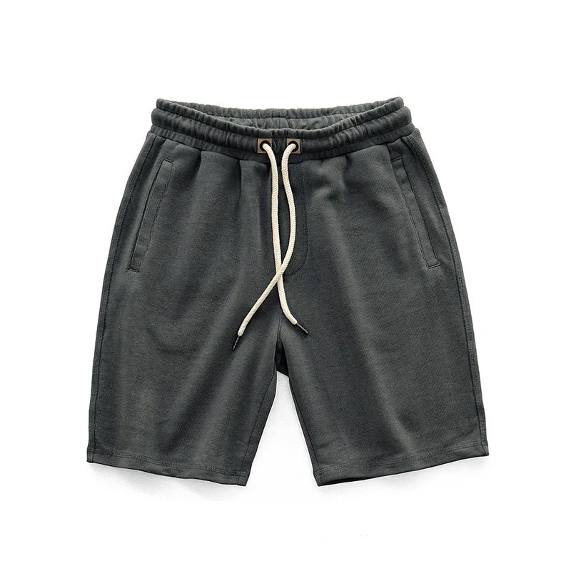 Herrshorts med dragsko i midjan, avslappnad passform och sidofickor
