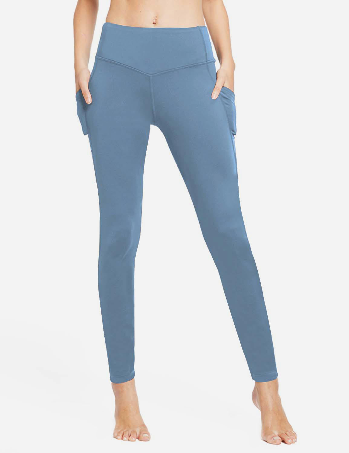 Damlånga termoleggings med fickor och hög midja