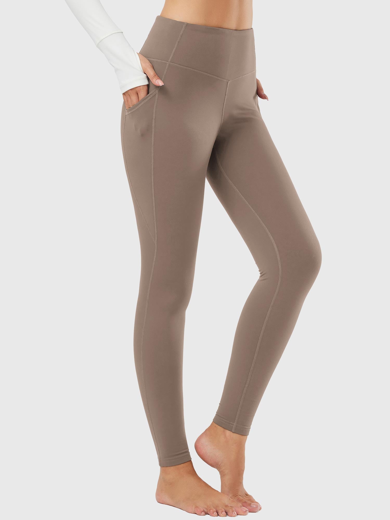 Damlånga termoleggings med fickor och hög midja