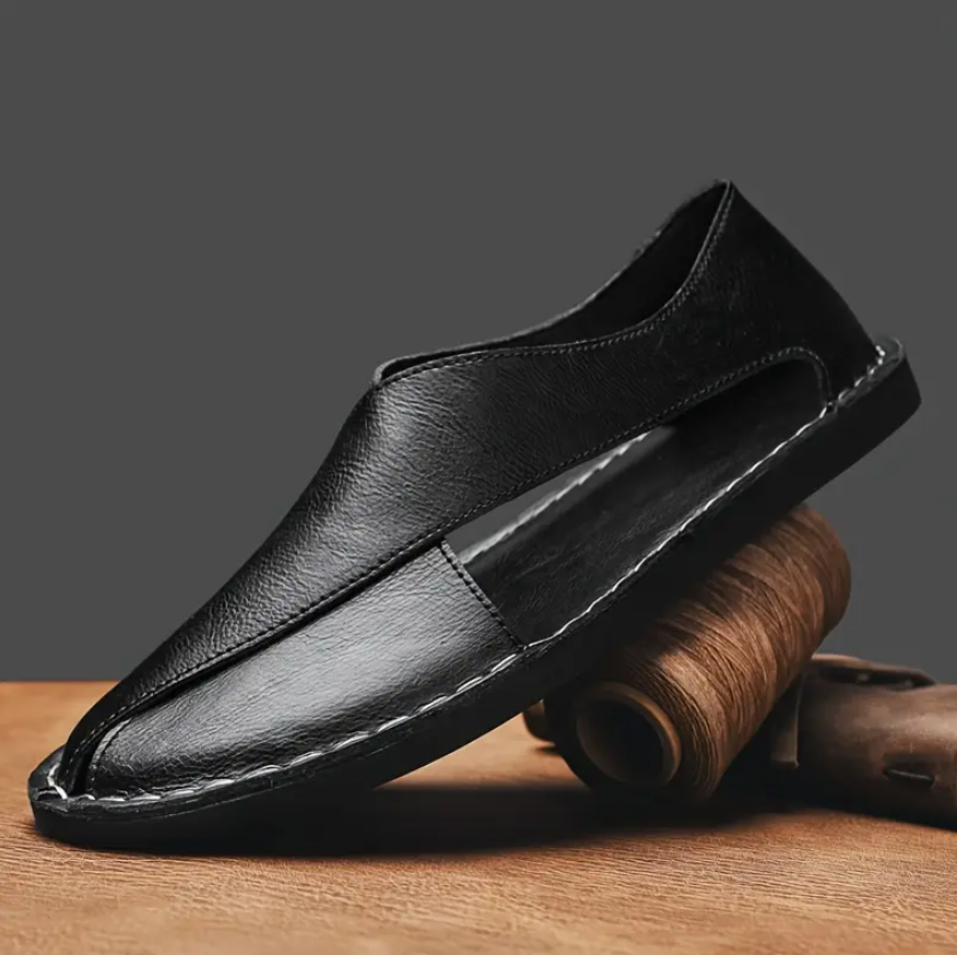 Herrsandaler med korsad design och handsydda detaljer