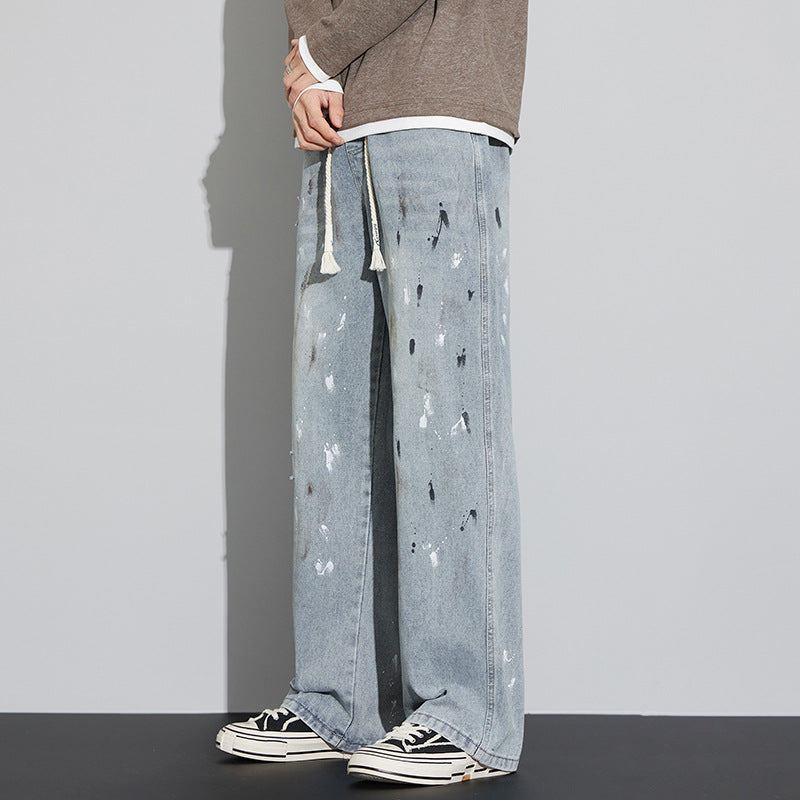 Herrjeans med Sliten Graffiti-Print och Dragsko i Midjan, Microelastisk Passform