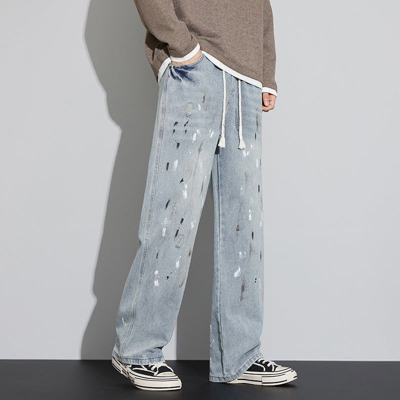 Herrjeans med Sliten Graffiti-Print och Dragsko i Midjan, Microelastisk Passform