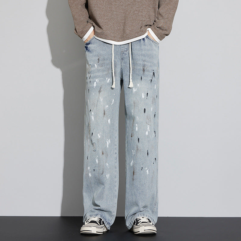 Herrjeans med Sliten Graffiti-Print och Dragsko i Midjan, Microelastisk Passform