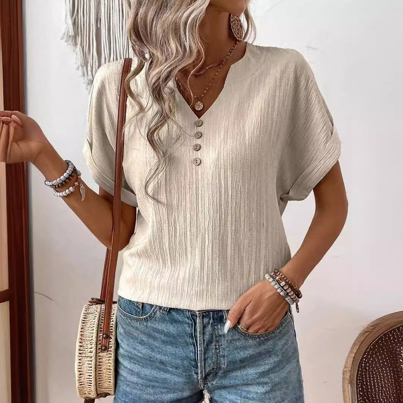 Kortärmad sommar-t-shirt för dam med V-ringning och knappdetalj