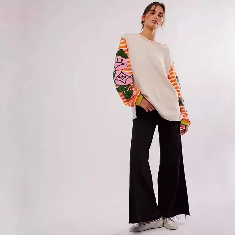 Kvinnors Vårtröja med Löst Sittande Passform, Randigt Lapptäcke och Blommig Broderi