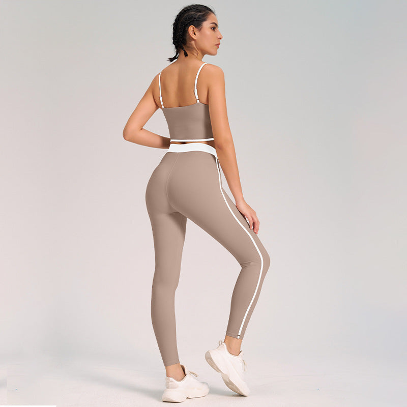 Tvådelat yogaset för damer med ärmlös topp och högmidjade leggings