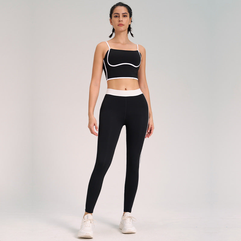 Tvådelat yogaset för damer med ärmlös topp och högmidjade leggings