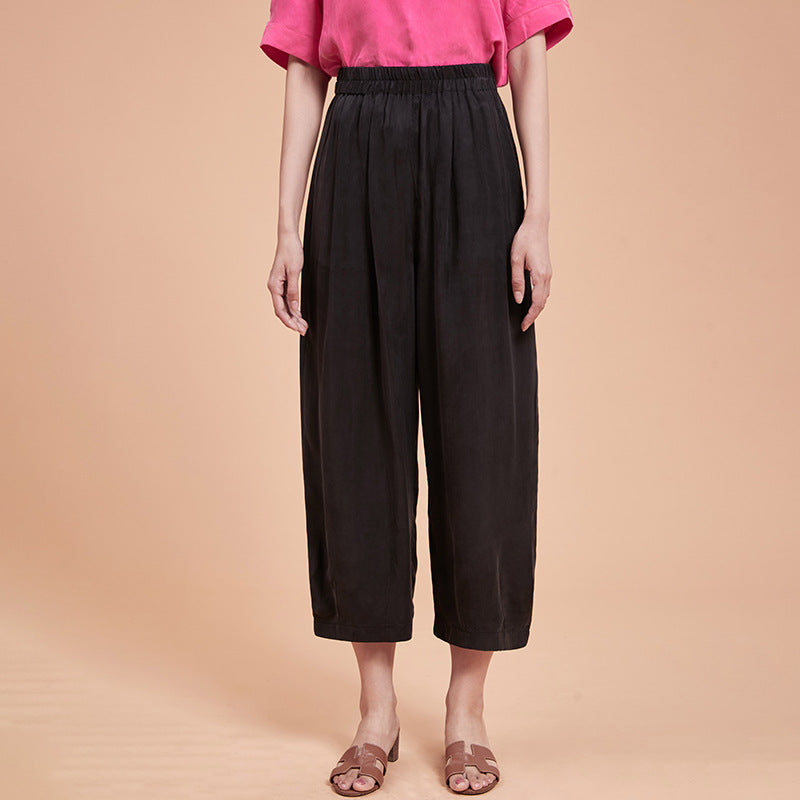 Dambyxor med vida ben, draperad design och nio-punkts längd