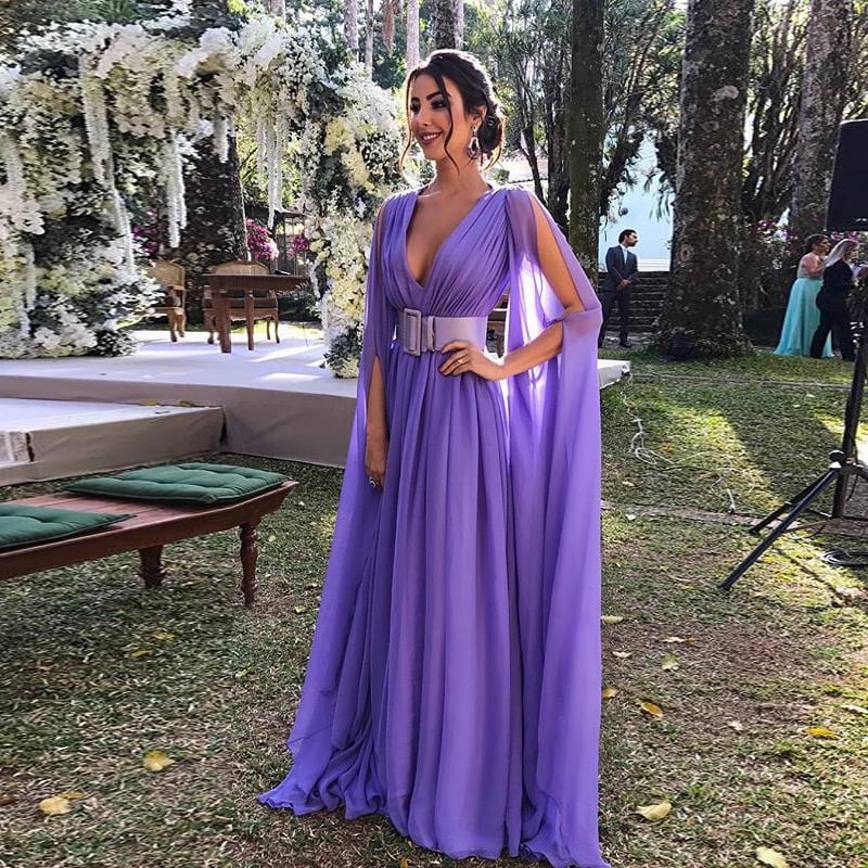 Kvinnors vår- och sommarklänning, golvlång, med djup V-ringning och åtsittande midja