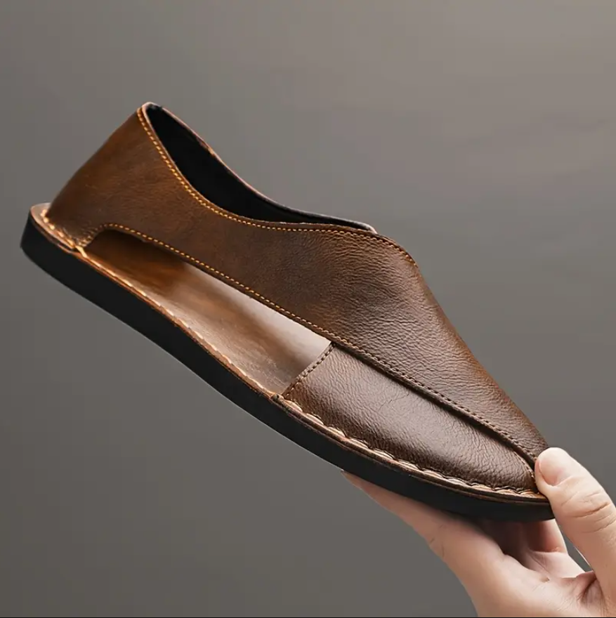 Herrsandaler med korsad design och handsydda detaljer