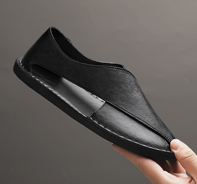 Herrsandaler med korsad design och handsydda detaljer