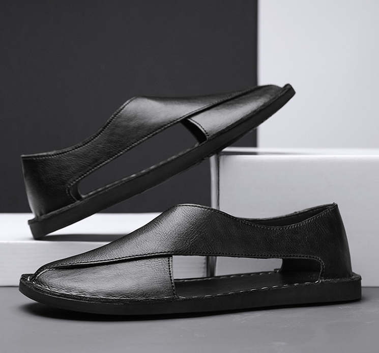 Herrsandaler med korsad design och handsydda detaljer